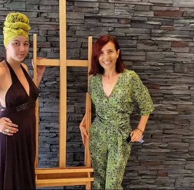 Artists posing with their work