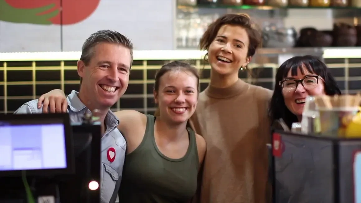 Blue Hand Group team members smiling
